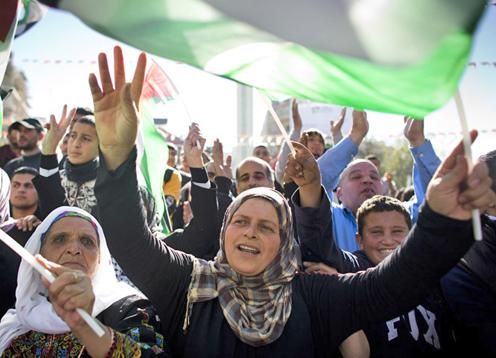 Palestinians in Ramallah celebrate the UN vote on observer status