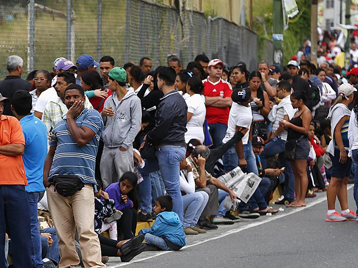 Waiting in line for basic supplies in Caracas