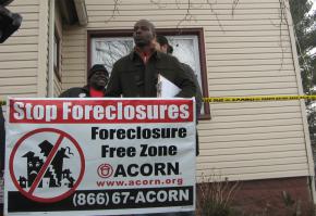 Around 100 people gathered in front of the foreclosed home of Myrna Millington in Queens to protest her threatened eviction