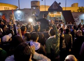 Protesters as they prepare to storm the State Security Apparatus headquarters in Nasr City